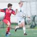 Father Gabriel Richard's Melissa Downer and Hanover-Horton's Kalee Strigham fight for the ball during the first half of the regional semifinal game at Father Gabriel Richard High School, Wednesday, May 29.
Courtney Sacco I AnnArbor.com  